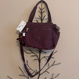 Brand new “Kipling “shoulder bag for women.Color-dark plum tonal.Size-14”x10”💜